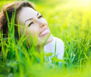 gluten-woman-in-grass-300x252